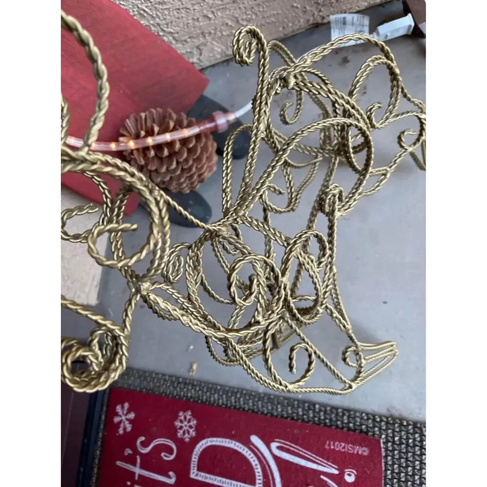 Two wrought iron Christmas Reindeer Gold filigree decorations